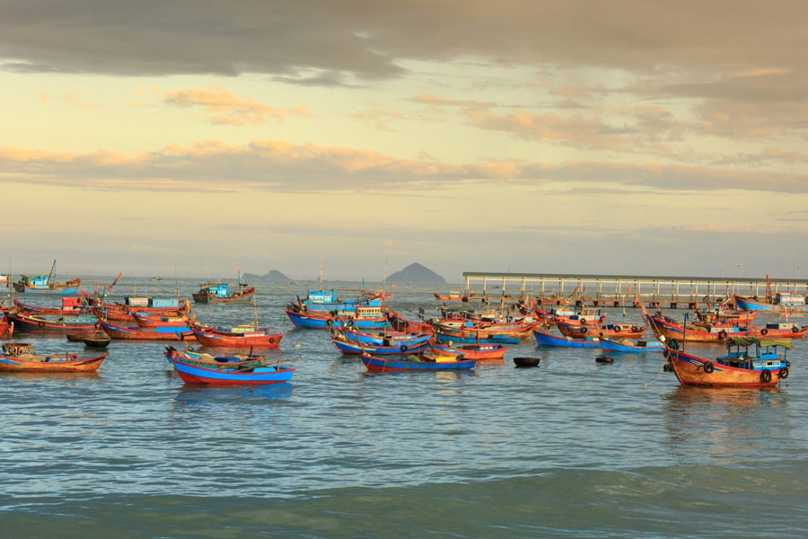 Traditional Vietnamese fishing village life captured along the shores of Nha Trang