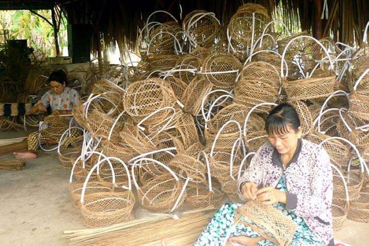 Village artisanal traditionnel dans le Delta du Mékong