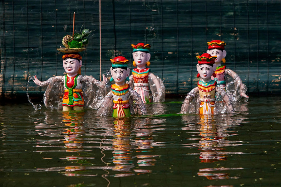 Des spectacles de marionnettes sur l'eau est l'une des spécialité à Hanoi en hiver